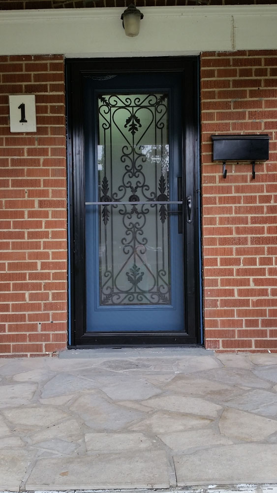 red brick home with storm door companies toronto
