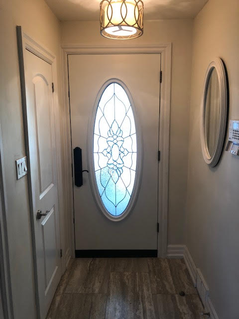 steel-door-installation-replacement-toronto-oval-glass-inside