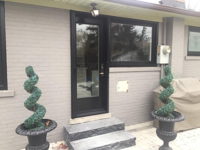 steel-door-installation-replacement-toronto-custom-black-courtyard